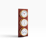 Autonautic atlantic 95 EG hout met gouden instrumenten verticaal gepresenteerd met een schaduw
