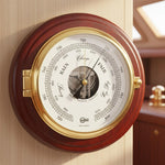 Barigo Captain barometer met thermometer Ø210 mm – mahonie messing uitvoering 1585MS in een luxe sfeerbeeld op een houten achtergrond