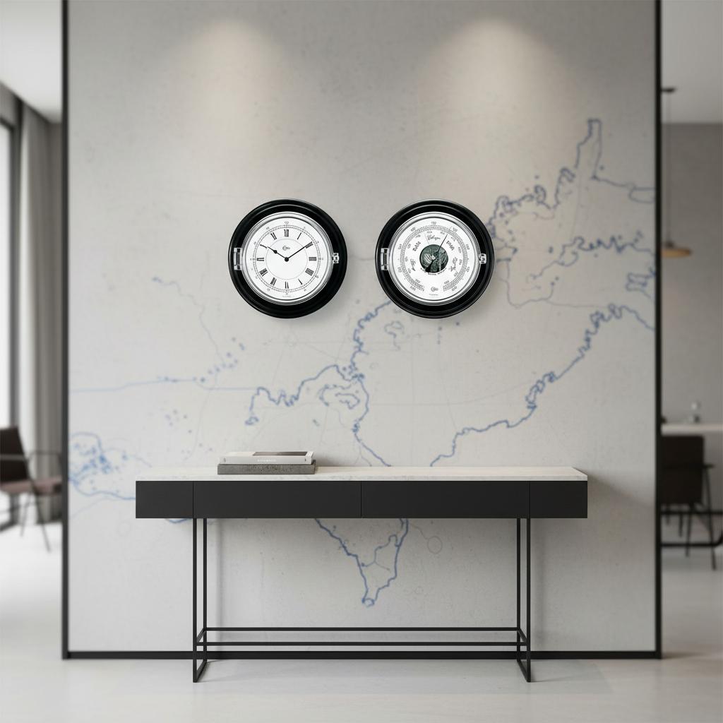 Barigo Captain scheepsklok en barometer set 210 mm met thermometer functie zwarte ronde wandplaat met verchroomde behuizing hangend in een captains hut aan een moderne zwart met witte wand