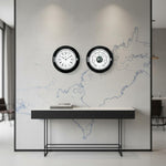 Barigo Captain scheepsklok en barometer set 210 mm met thermometer functie zwarte ronde wandplaat met verchroomde behuizing hangend in een captains hut aan een moderne zwart met witte wand