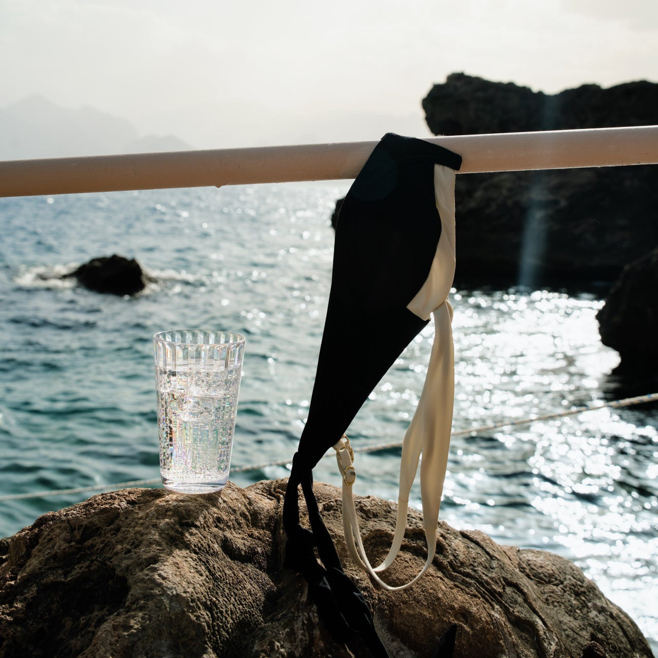 Flamefield Crystal tumbler on a rock 
