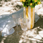 Flamefield_glas_met_vaas_en_gele_bloemen