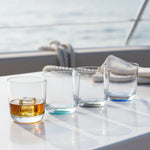 Marc Newson palm whisky glasses on the table on a boat