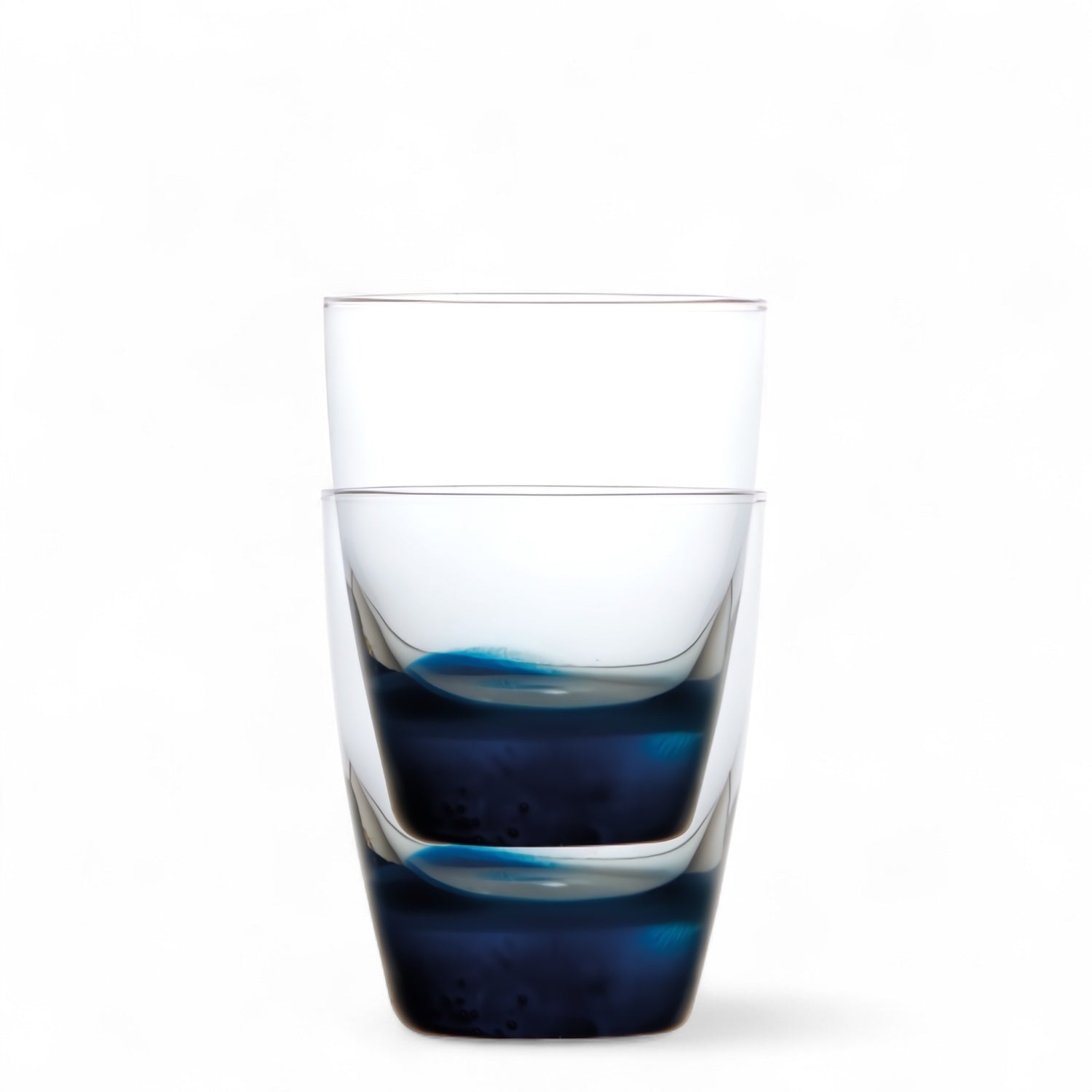 Marine Business waterglas Party blauw 310 ml set van 2 glazen met blauwe bodem op elkaar gestapeld
