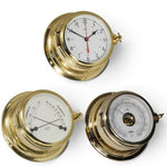 Schatz Midi 3-delige klokkenset in messing bestaande uit een Quartz scheepsklok met scheepsbel en arabischewijzerplaat, een high sensitive barometer en een comfortmeter.
