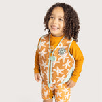 Seastar | Oranje Zwemvest 3–6 jaar met zeesterren met een kind met krullen