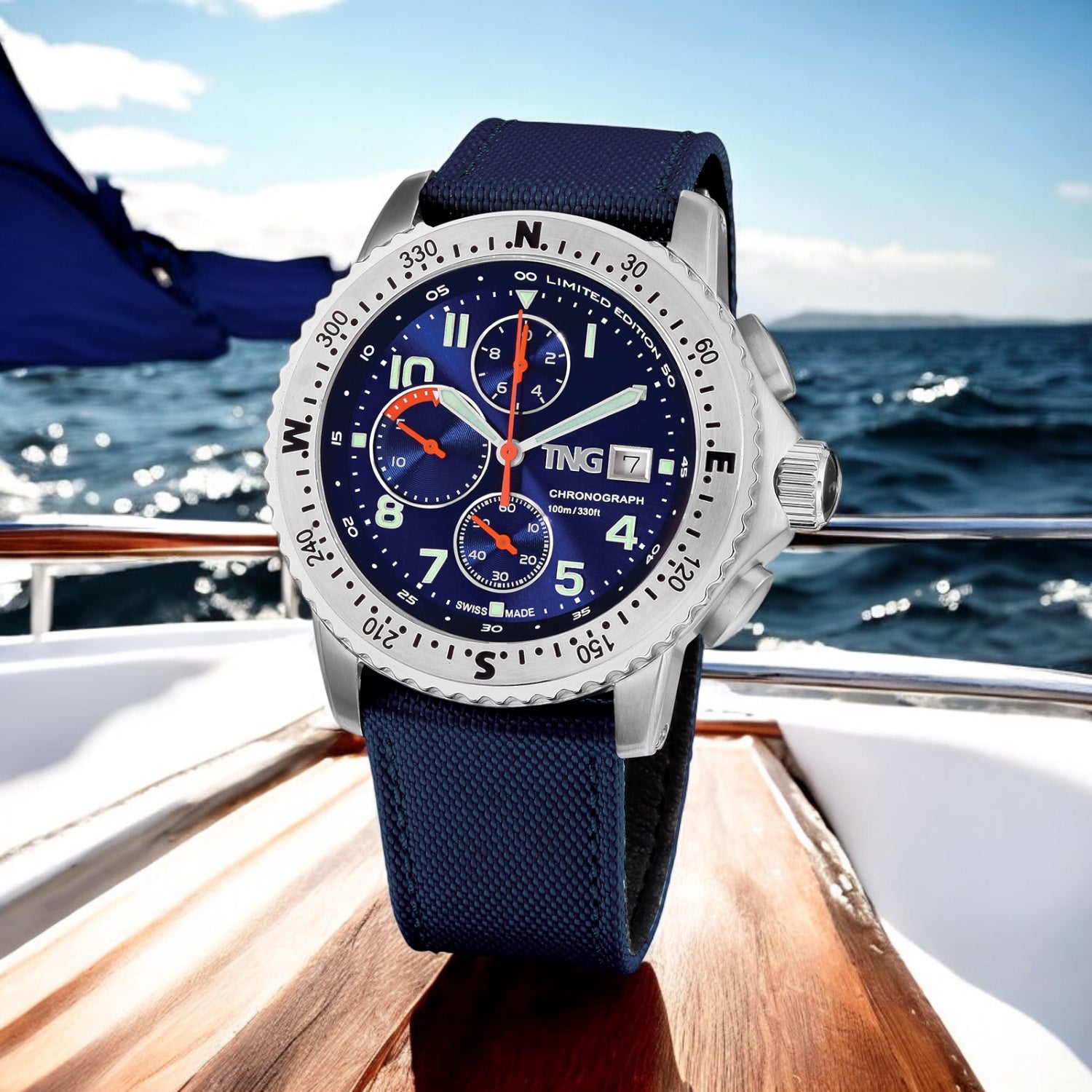 TNG Baltic Cup 43mm -blueDial navy strap on a sailing boat