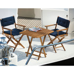 Twee regisseursstoelen_I_deluxe_-_ongeolied_teak_met_navy_kussen met Southhampton teak tafel op boot