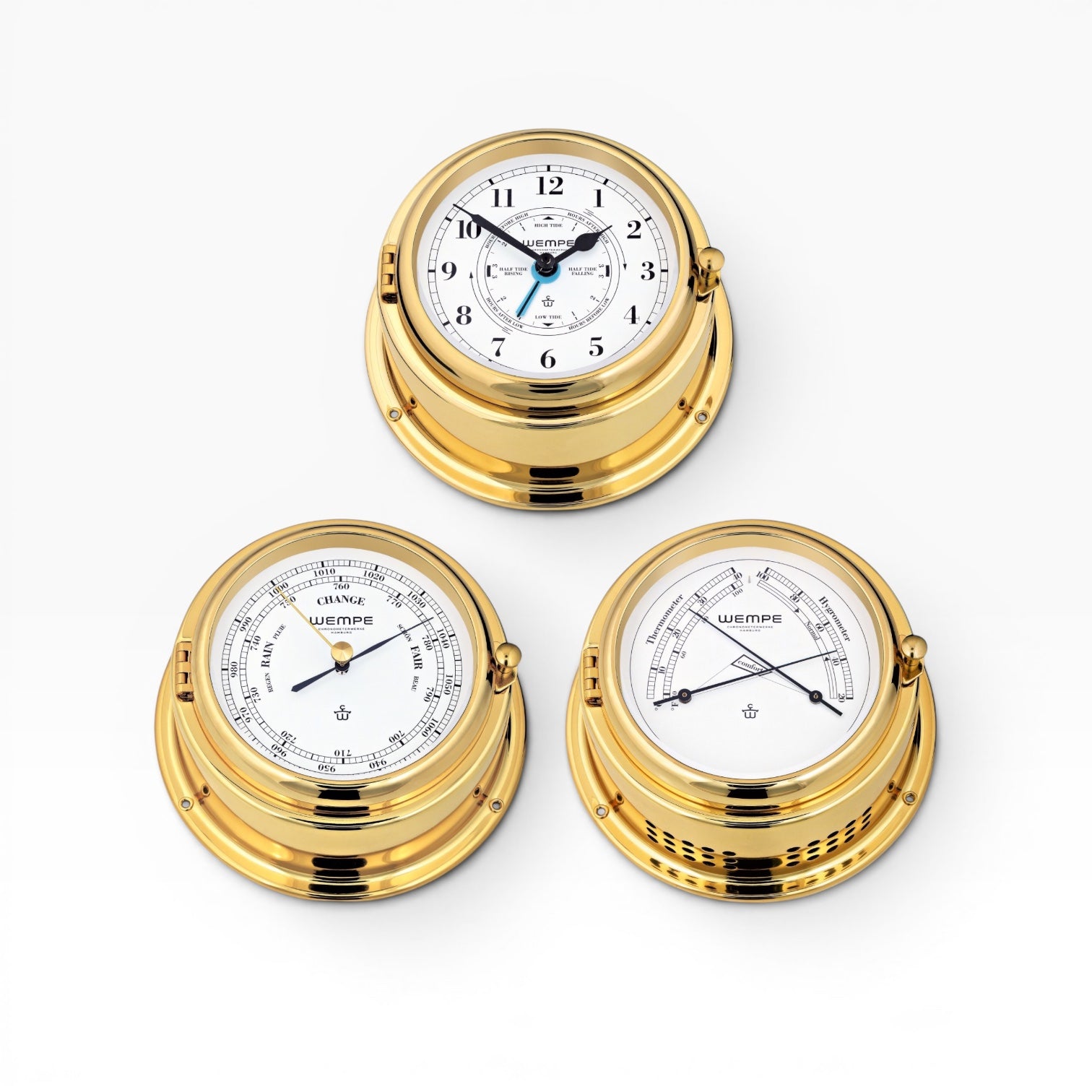 Wempe Bremen II set van 3 messing getijden scheepsklok Arabische wijzerplaat,barometer en thermohygrometer n een afbeelding